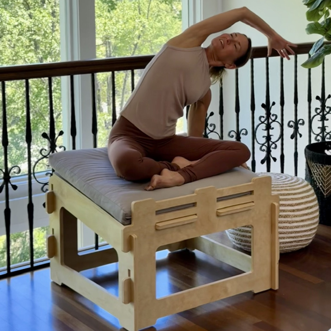 Yoga instructor demonstrating chair yoga postures