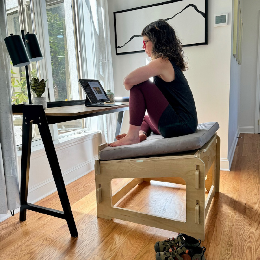 Woman sitting on Higher Ground Chair